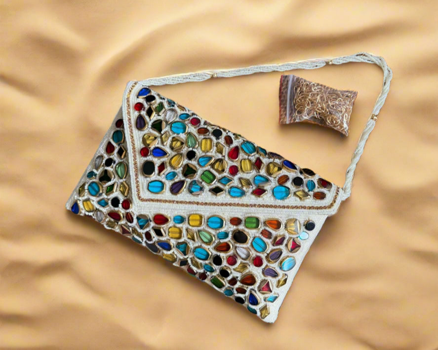 White gemstone beaded clutch.