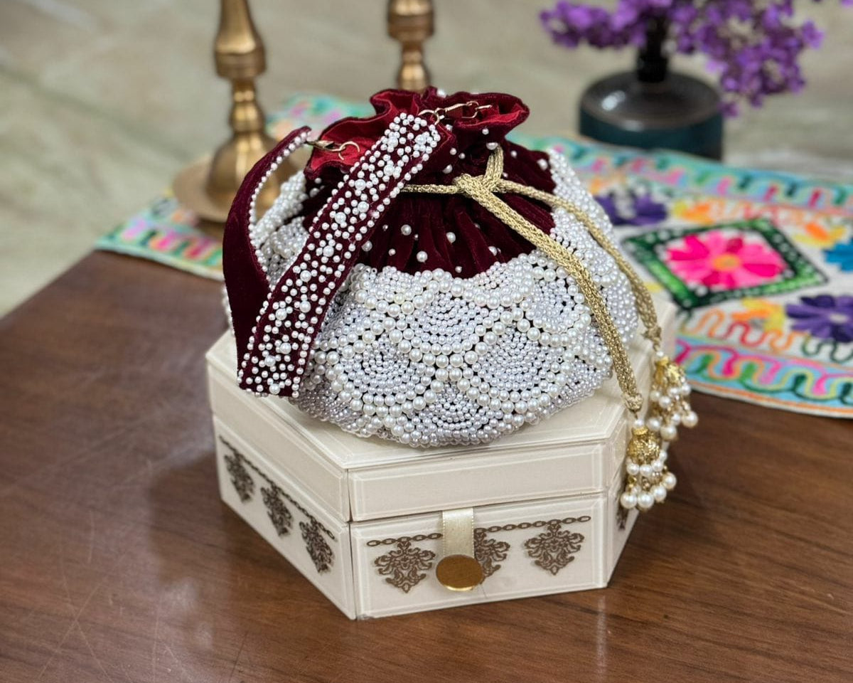Pearl embellished clutch