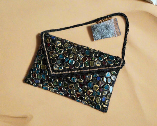 Black gemstone beaded clutch.