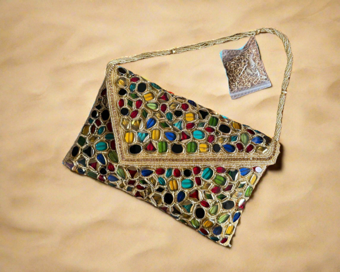 Gold gemstone beaded clutch.