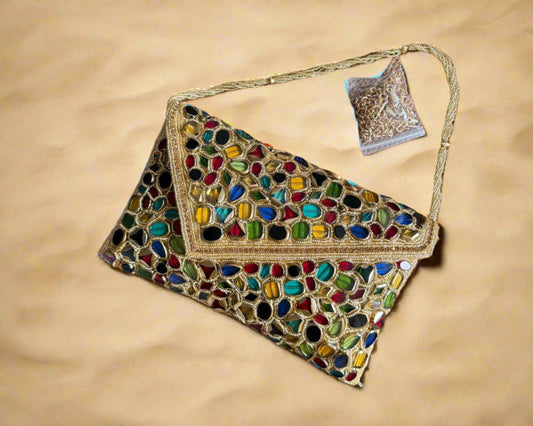 Gold gemstone beaded clutch.